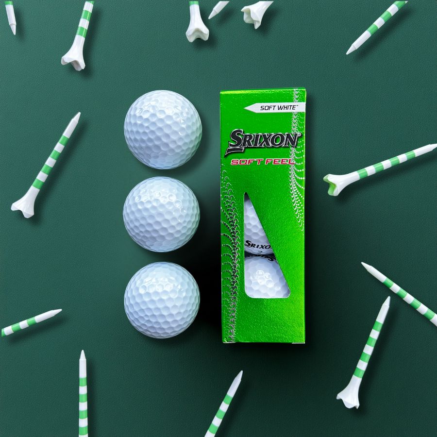Golf tees scattered. Part of golf gift basket.